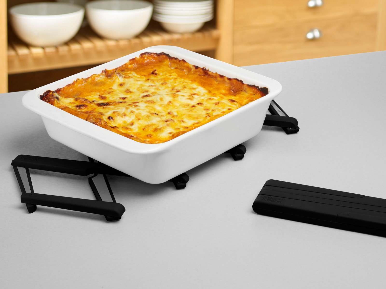 2-joseph_joseph_stretsch_silikone_pot_stand_black_untersetzer_platzsparend_1